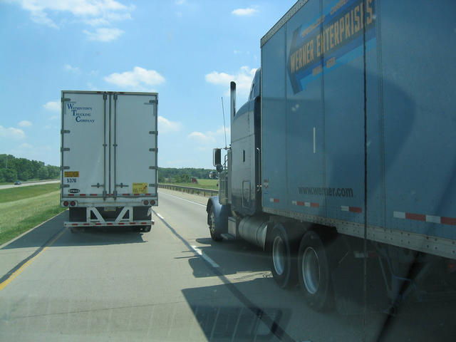 ../pictures/lets_see_if_we_can_squise_between_those_two_trucks.jpg